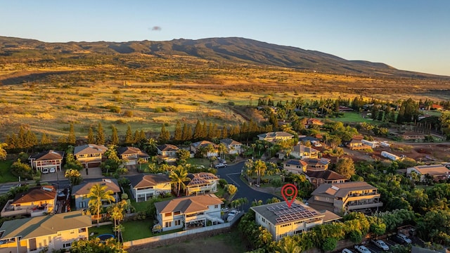 drone / aerial view featuring a mountain view