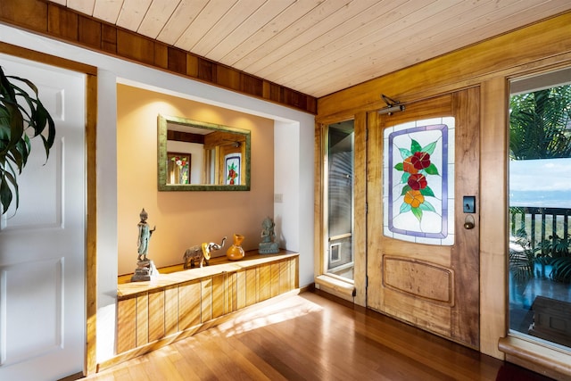 entryway featuring hardwood / wood-style floors and wooden ceiling