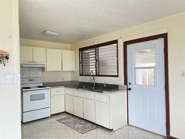 737 Kolani Pl, Wailuku, HI 96793 - kitchen with under cabinet range hood, a textured ceiling, a sink, light tile patterned flooring, and white electric range