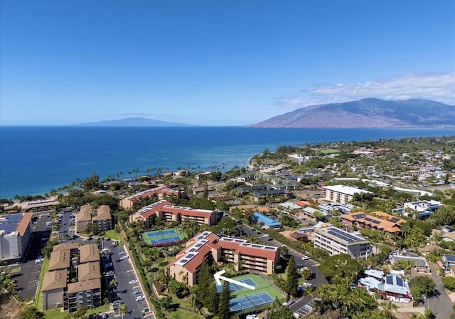 aerial view featuring a water and mountain view