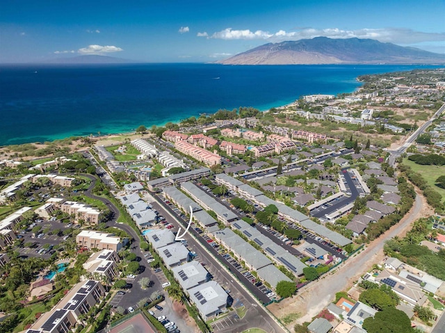 aerial view featuring a water and mountain view