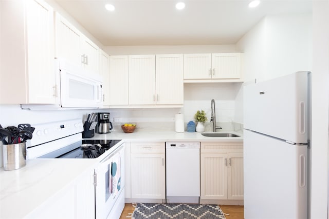 3823 Lower Honoapiilani Rd Unit 302, Lahaina, HI 96761 - kitchen with white appliances, a sink, light countertops, tasteful backsplash, and recessed lighting