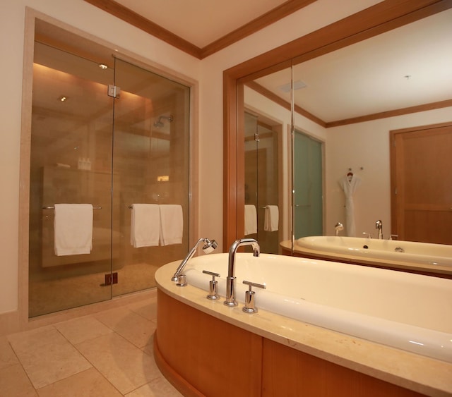 bathroom with tile floors, ornamental molding, and separate shower and tub