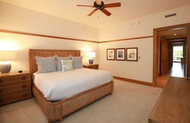 carpeted bedroom featuring ceiling fan