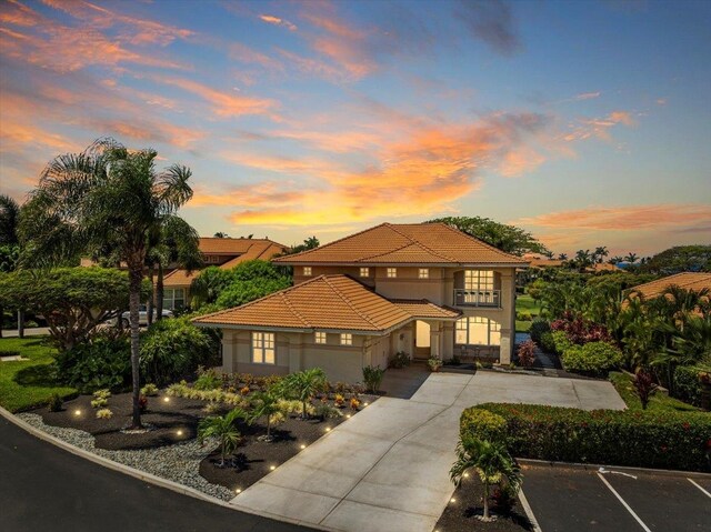 357 Umeke St Unit 144, Kihei, HI 96753 - mediterranean / spanish house with a tiled roof, uncovered parking, and stucco siding