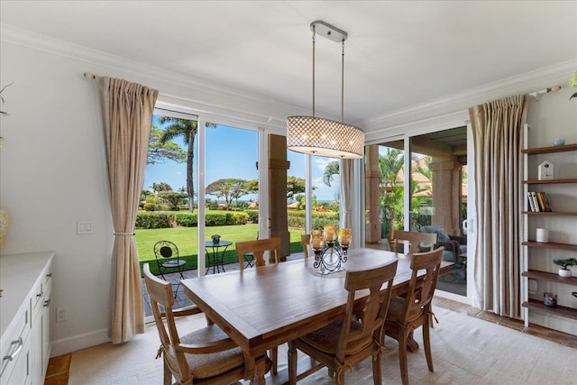 357 Umeke St Unit 144, Kihei, HI 96753 - dining space featuring crown molding and baseboards