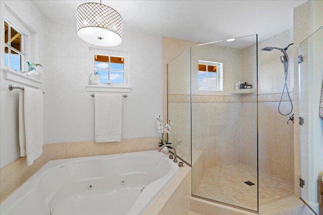 357 Umeke St Unit 144, Kihei, HI 96753 - bathroom featuring a shower stall and a jetted tub