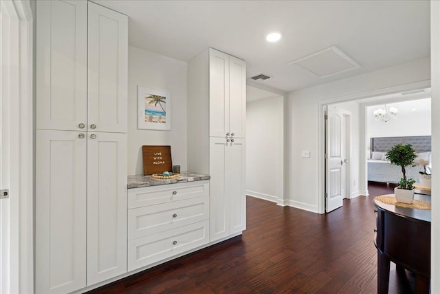 357 Umeke St Unit 144, Kihei, HI 96753 - corridor with attic access, visible vents, baseboards, recessed lighting, and dark wood-type flooring