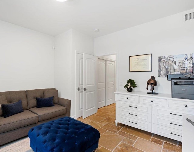 357 Umeke St Unit 144, Kihei, HI 96753 - interior space with visible vents and stone tile flooring