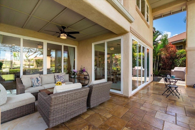 357 Umeke St Unit 144, Kihei, HI 96753 - view of patio / terrace with a ceiling fan and an outdoor hangout area