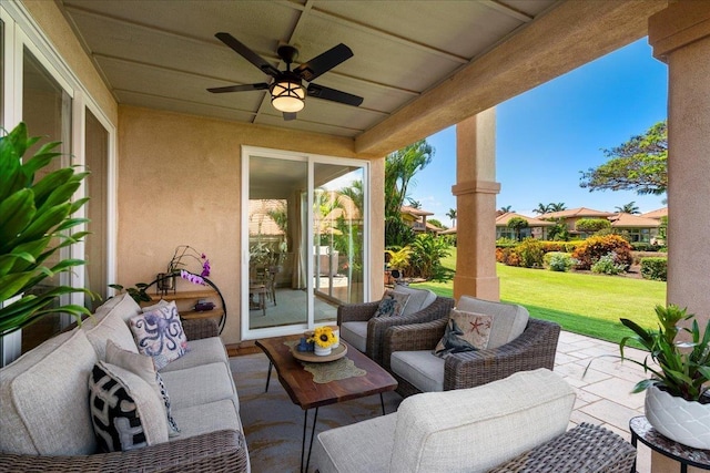 357 Umeke St Unit 144, Kihei, HI 96753 - view of patio / terrace with ceiling fan and an outdoor living space