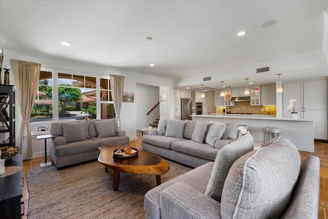 357 Umeke St Unit 144, Kihei, HI 96753 - living area with recessed lighting, ornamental molding, stairs, and visible vents