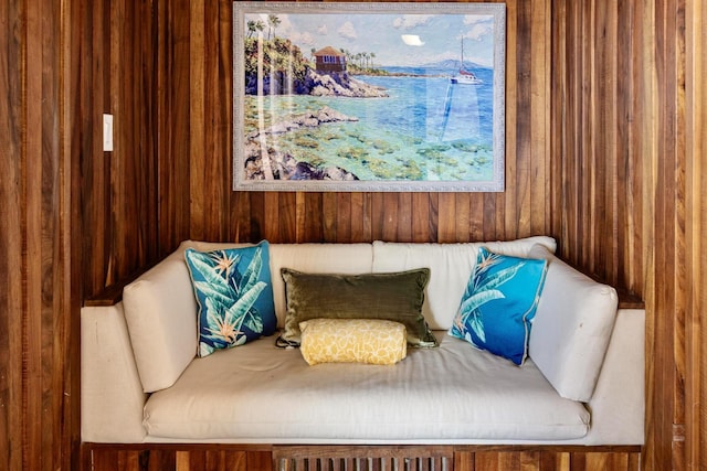 sitting room with wood walls