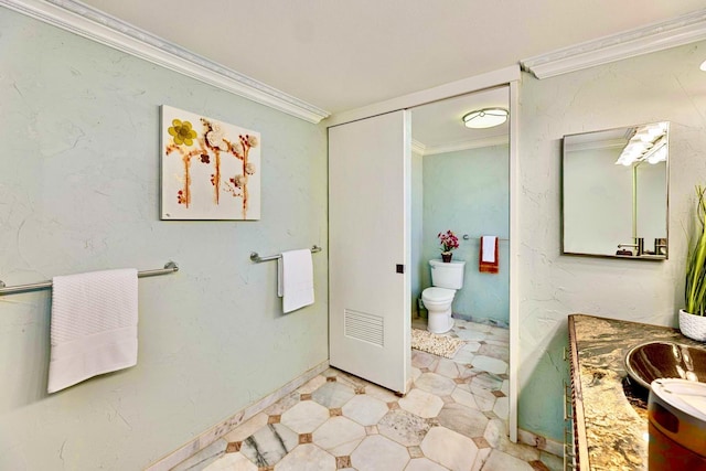 full bathroom featuring tile patterned floors, vanity, ornamental molding, and toilet