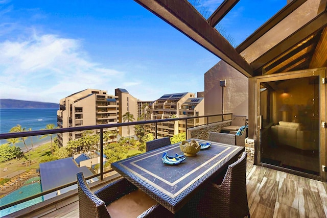 balcony featuring a water view