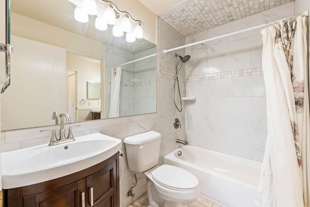 140 Uwapo Rd Unit 18-203, Kihei, HI 96753 - bathroom featuring shower / bath combo, vanity, and tile walls