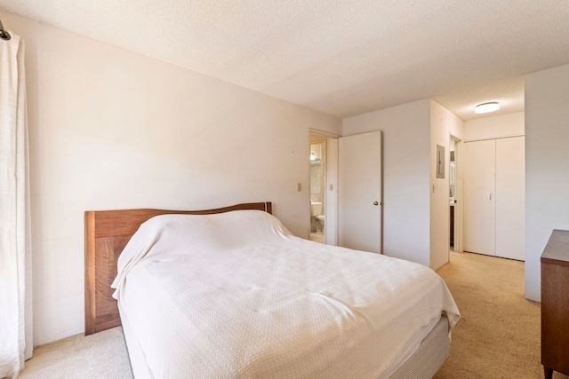 140 Uwapo Rd Unit 18-203, Kihei, HI 96753 - bedroom with light colored carpet