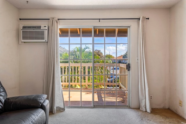 140 Uwapo Rd Unit 18-203, Kihei, HI 96753 - doorway featuring healthy amount of natural light, carpet, and a wall mounted AC