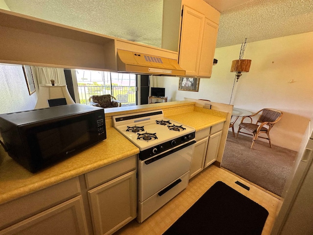 kitchen featuring custom range hood, light carpet, white gas range, kitchen peninsula, and a textured ceiling