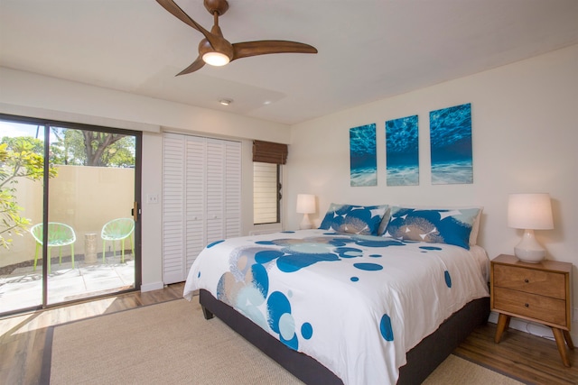 bedroom with ceiling fan, hardwood / wood-style floors, and access to exterior