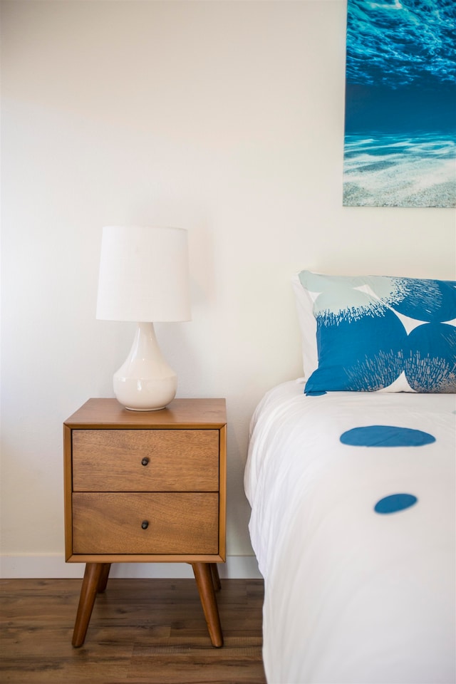 bedroom featuring dark wood-type flooring