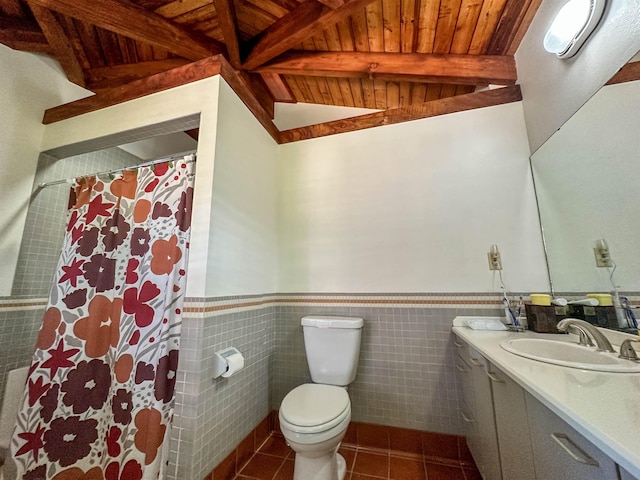 bathroom featuring toilet, vanity, tile walls, lofted ceiling with beams, and wooden ceiling