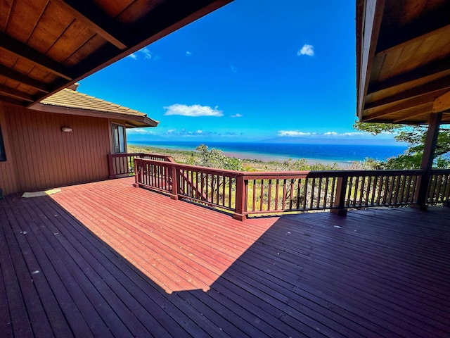 deck featuring a water view