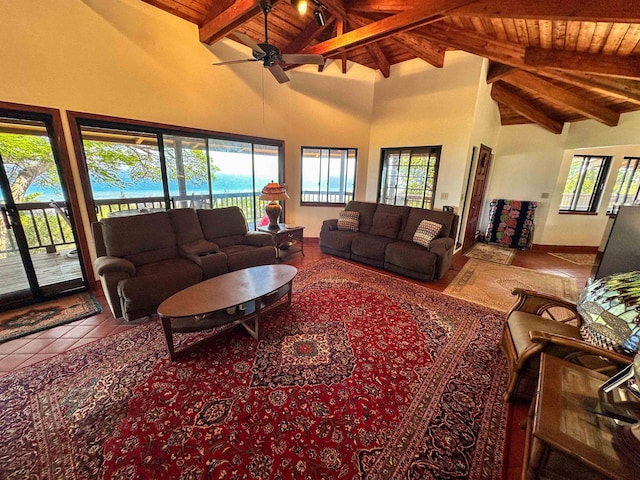 tiled living room featuring a water view, wood ceiling, beam ceiling, and high vaulted ceiling