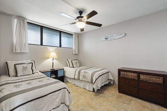 bedroom featuring ceiling fan