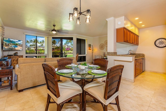 155 Wailea Ike Pl Unit 67, Kihei, HI 96753 - dining area with light tile patterned flooring, ceiling fan, recessed lighting, and ornamental molding