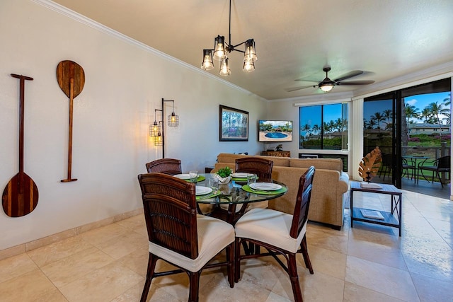 tiled dining space featuring crown molding and ceiling fan with notable chandelier