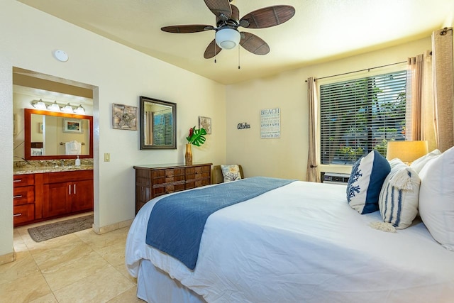 bedroom featuring ensuite bath, sink, light tile patterned floors, and ceiling fan