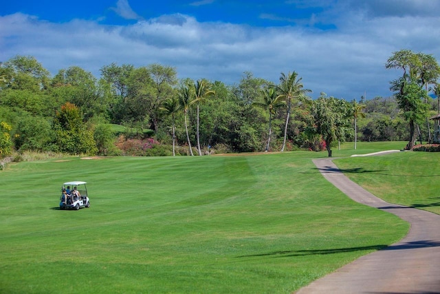 155 Wailea Ike Pl Unit 67, Kihei, HI 96753 - view of community with view of golf course and a yard