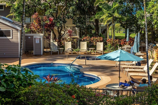 155 Wailea Ike Pl Unit 67, Kihei, HI 96753 - view of swimming pool featuring a pool and a patio area