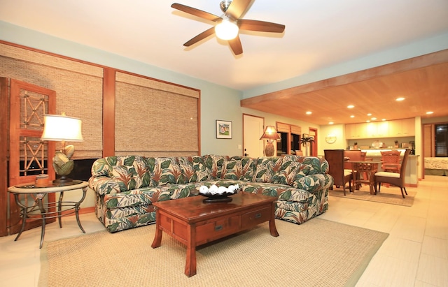 tiled living room featuring ceiling fan