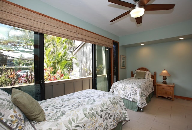 bedroom featuring tile flooring and ceiling fan