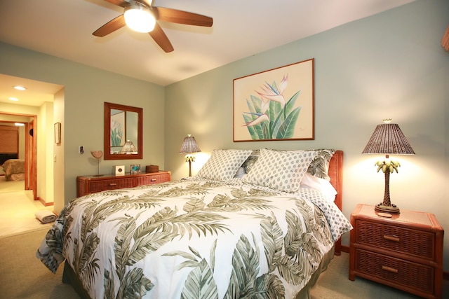 bedroom featuring ceiling fan and carpet flooring