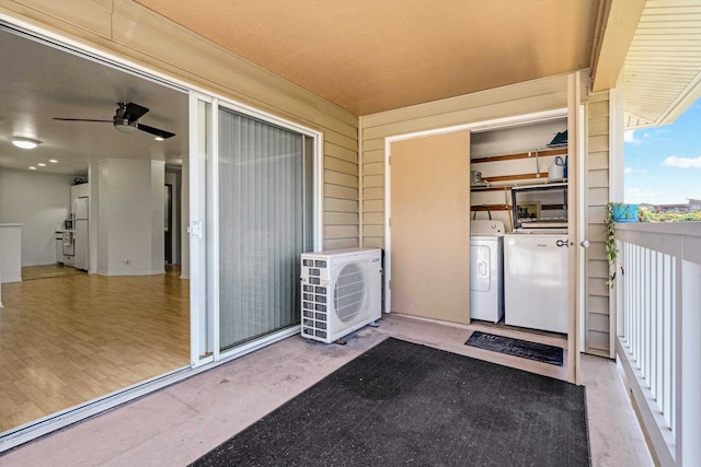 doorway to property with separate washer and dryer