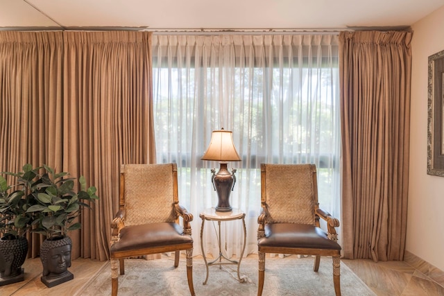 sitting room featuring plenty of natural light