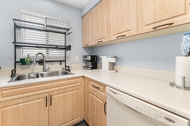 kitchen featuring sink, white dishwasher, and light brown cabinets