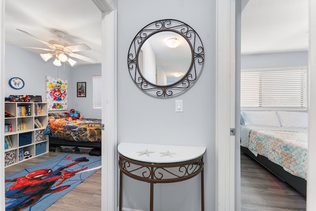 bedroom featuring ceiling fan and wood-type flooring