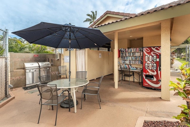 view of patio / terrace featuring an outdoor kitchen and area for grilling