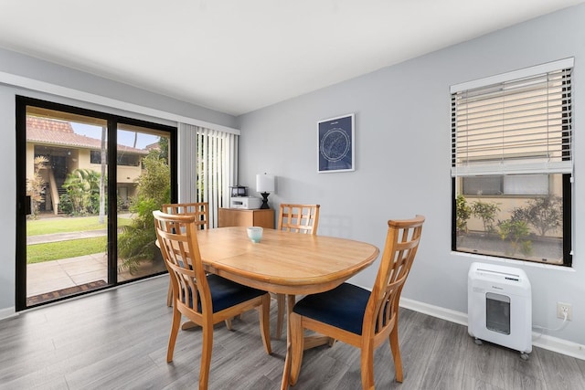 dining room featuring hardwood / wood-style flooring