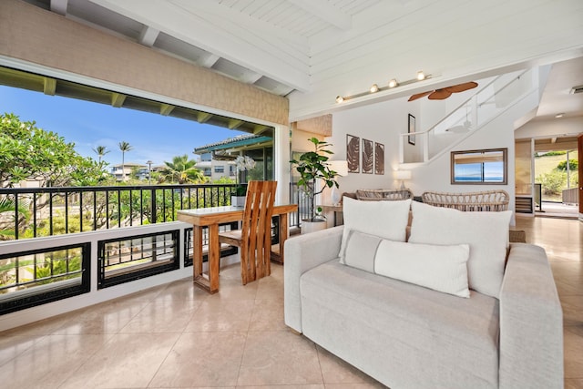500 Bay Dr Unit 28B2, Lahaina, HI 96761 - living room featuring tile patterned floors, beamed ceiling, and ceiling fan