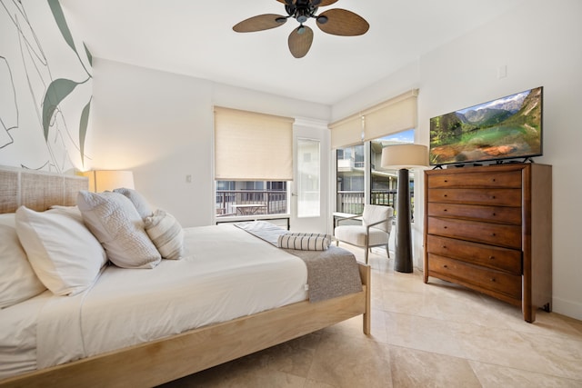 bedroom with access to exterior and ceiling fan