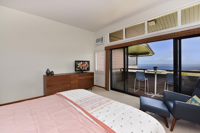 bedroom featuring multiple windows, a water view, and light colored carpet