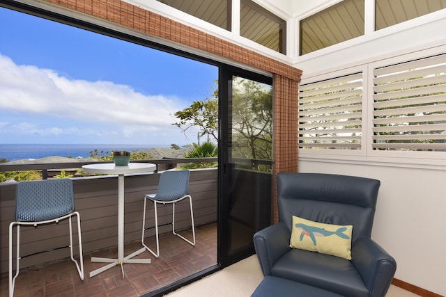 sunroom with a water view