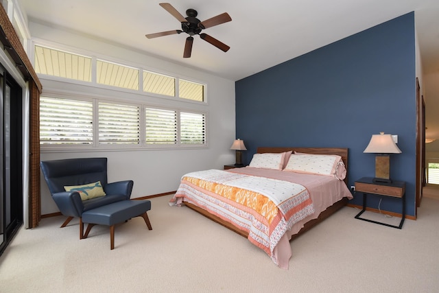 bedroom featuring ceiling fan and light colored carpet