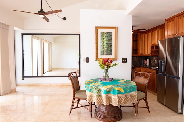 dining space featuring ceiling fan