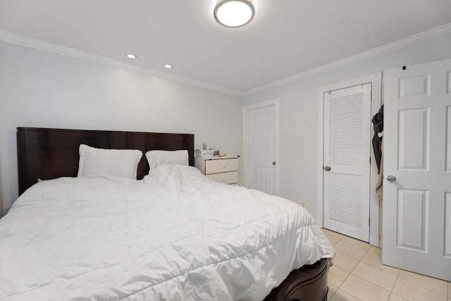 bedroom with light tile patterned flooring and ornamental molding